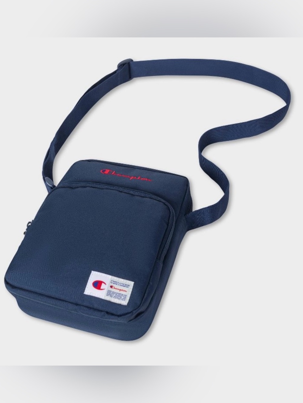 Champion unisex crossbody bag navy blue with red embroidered logo
